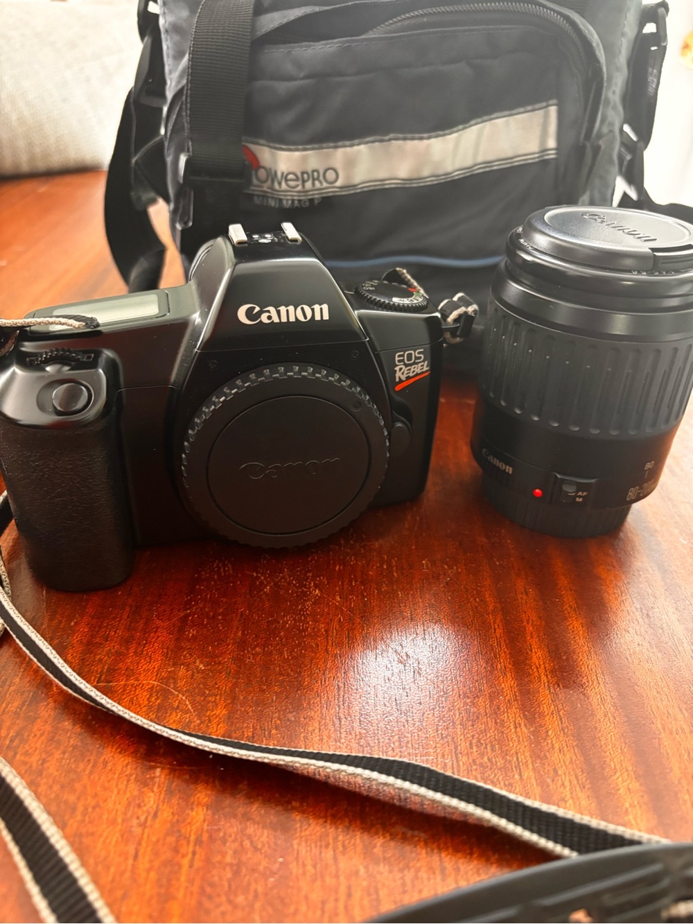 Canon EOS Rebel DSLR Camera Body with strap,80-200 Zoom Lens, bag and film